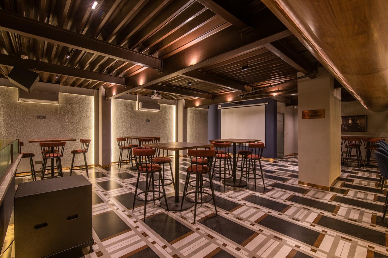 The Burrow — untreated room, parallel walls and low metal ceiling before acoustic treatment