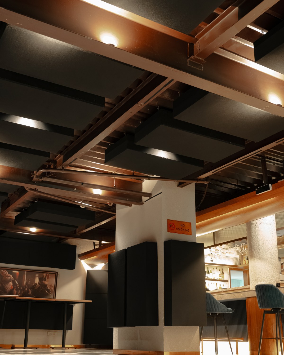 The treated ceiling at The Burrow, with the bar behind.